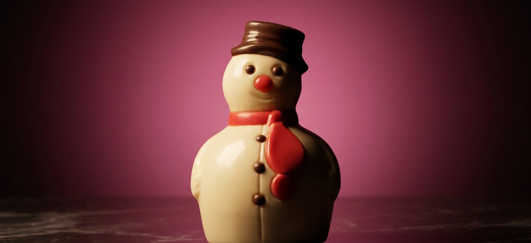 Chocolade sneeuwpop met sjaal